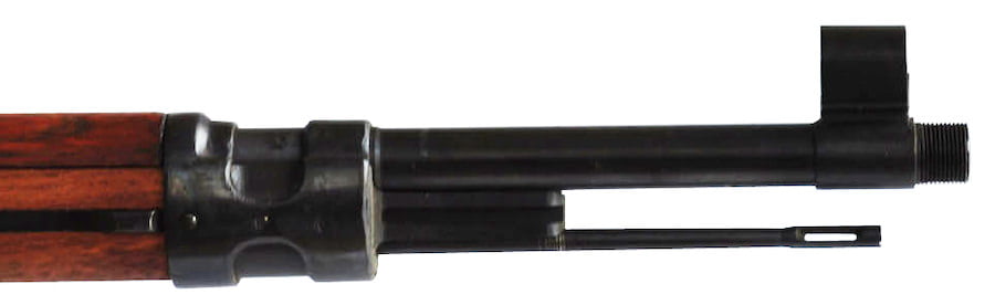 Muzzle end of the barrel with threading to accept suppressor or silencer.