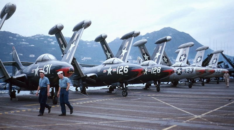 Grumman F9F-5 Panthers of fighter squadron VF-111 Sundowners on the flight deck of the aircraft carrier USS Lake Champlain (CVA-39), Hong Kong harbour, 1953. VF-111 was assigned to Carrier Air Group Four (CVG-4) during the deployment to Korea and the Western Pacific from 30 Jun 1953 to 04 Dec 1953. Date 1953 Source www.navsource.org [1] Author A. William Beam, AO3, VC-33